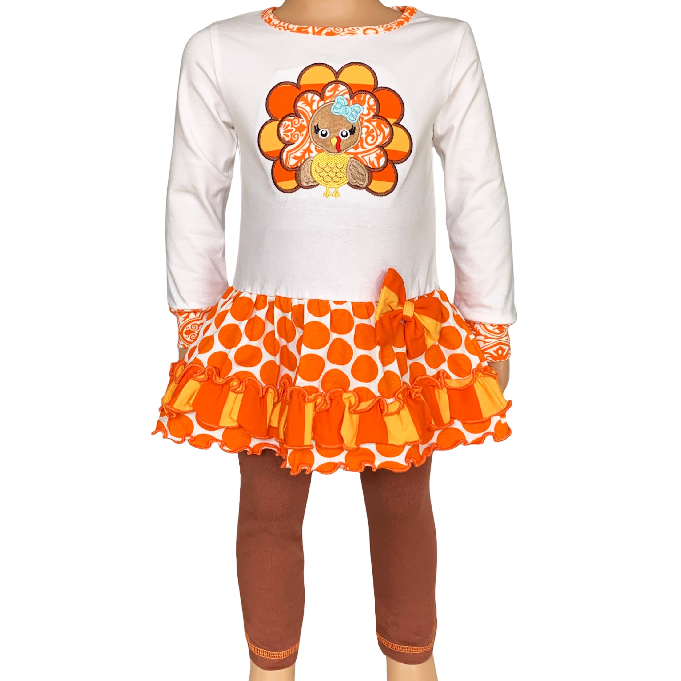 AnnLoren Big Little Girls Autumn Turkey Tunic & Leggings featuring a turkey applique, cream tunic, and orange knit leggings.